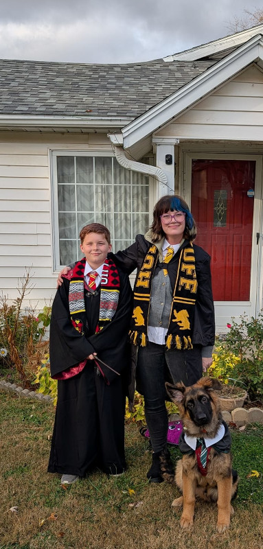 Beneath an ominous sky, the Lynch family show off their Harry Potter costumes.